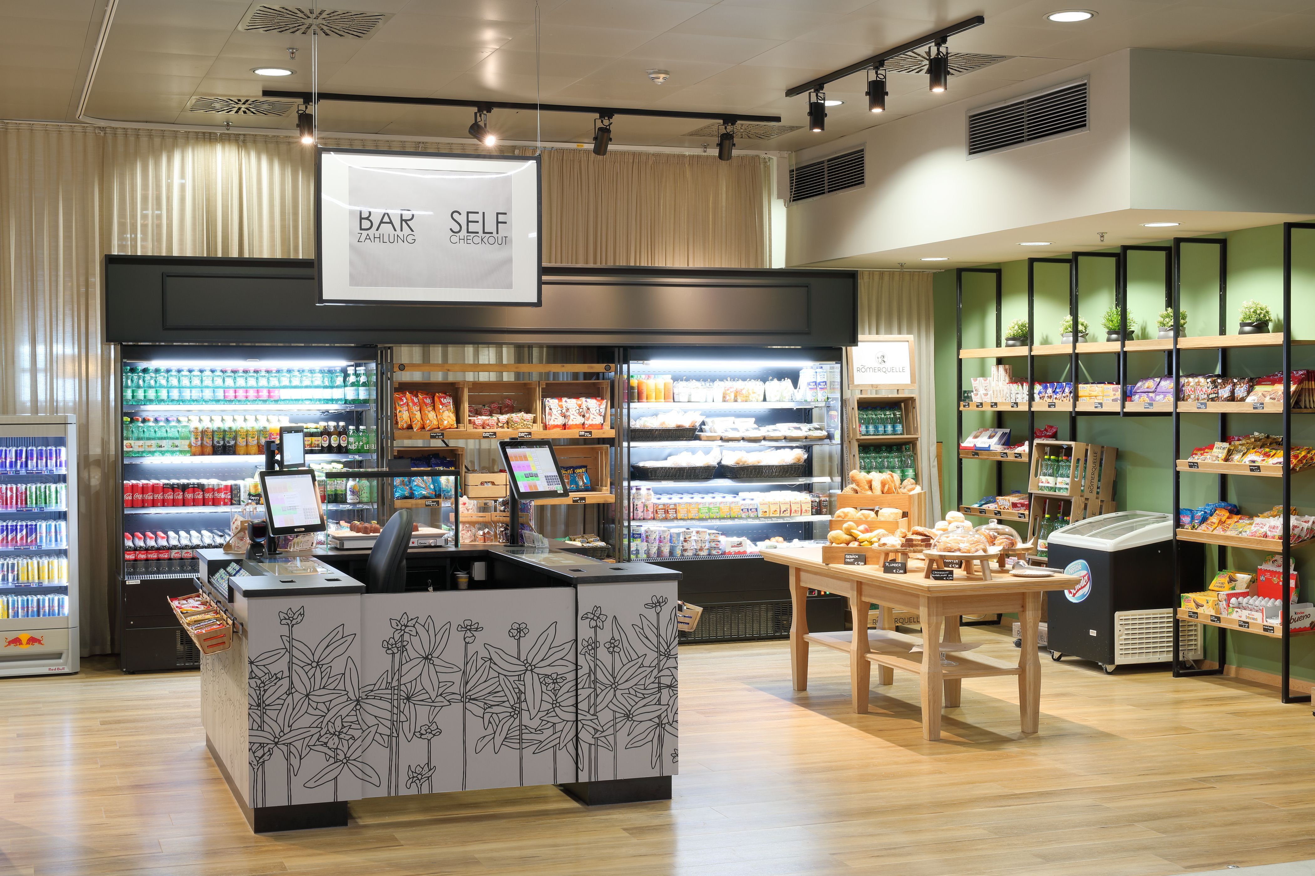 Photo: EURO PLAZA; Restaurant Plaza Eurest; self-service area in a friendly design; modern presentation of products on shelves and in refrigerators.